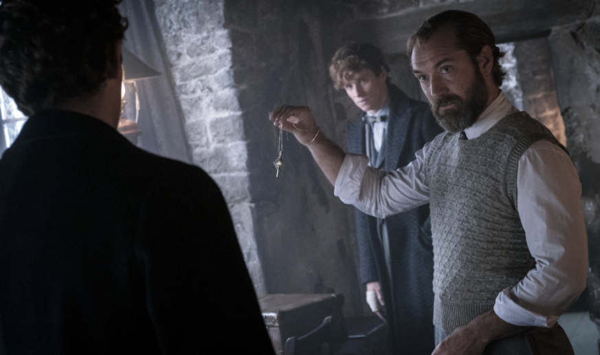 Albus Dumbledore (Jude Law) with Newt Scamander (Eddie Redmayne) in the back